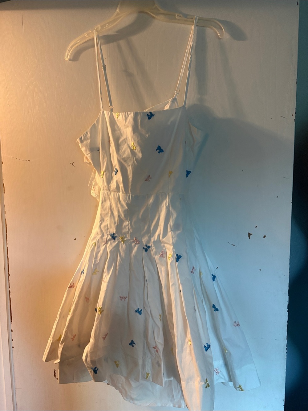 White Spaghetti-Strap Backless Dress with Blue, Yellow & Pink Bow Embroidery